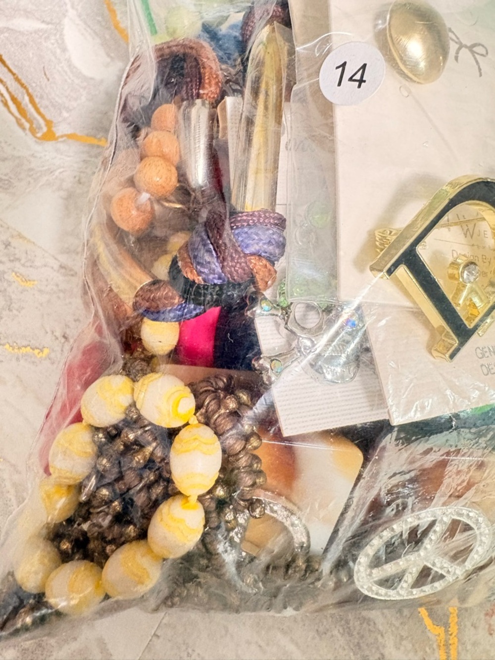Over 1 lb of vintage and modern lot of wearable necklaces, brooch and bracelets
